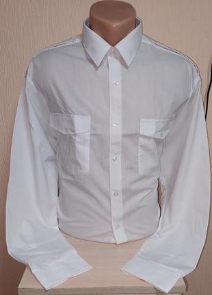 Стильная белая рубашка с длинными рукавами из смеси полиестера...