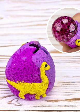 Антистресс яйцо динозавра с орбизом фиолетовый