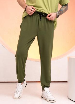 Трикотажные спортивные штаны цвета хаки с манжетами, размер XXL