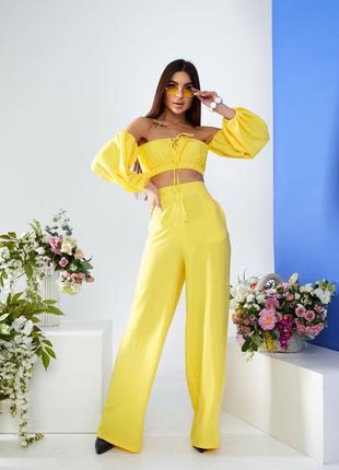 Женский костюм топ и брюки палаццо желтого цвета р.M 387280