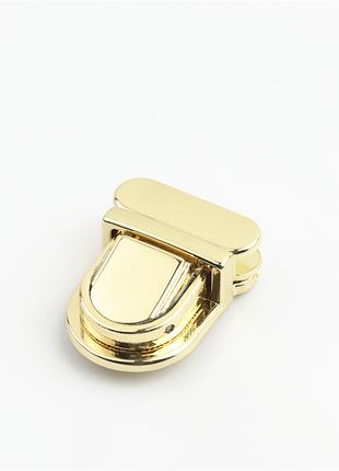Замок для сумки портфеля язичок 33*26 мм колір золото