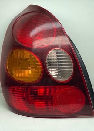 Задний левый фонарь Toyota Corolla E11 220-76587L