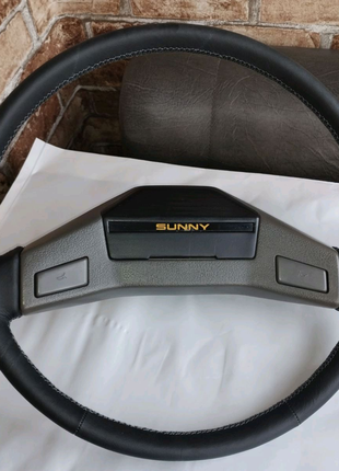 Руль Nissan Sunny перетянут кожей