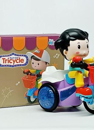 Игрушка shantou музыкальный велосипед "stunt tricycle" с девоч...