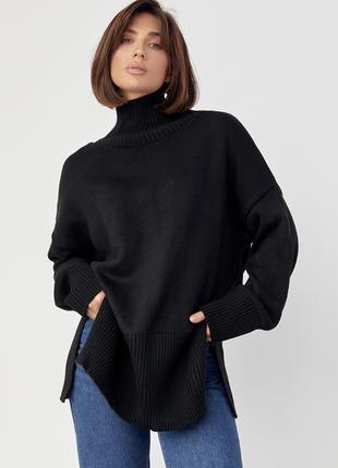 Жіночий трикотажний светр oversize з розрізами з боків - чорни...