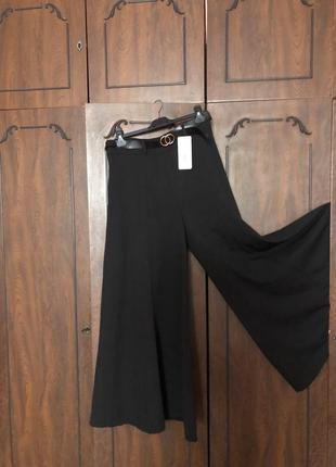 Новая итальянская юбка-брюки черного и кремового цветов р-р 46.