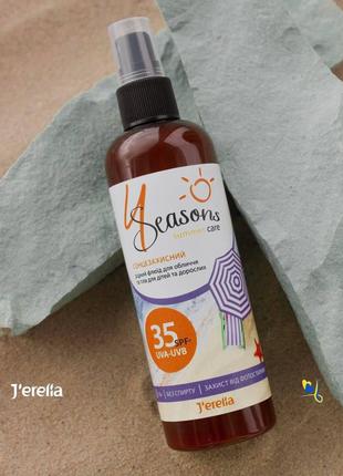 Спрей сонцезахисний флюїд для обличчя та тіла SPF 35 для дітей...