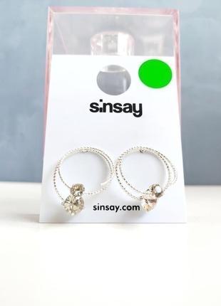 Нові сережки сріблясті кільця з камінцями sinsay