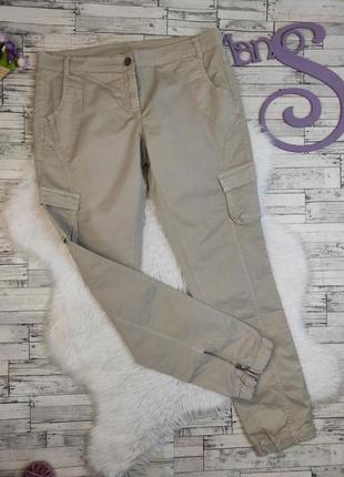 Женские брюки benetton бежевого цвета с накладными карманами р...