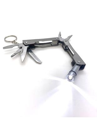 Нож-плоскогубцы с набором инструментов с фонариком (9 в 1) (7 см)