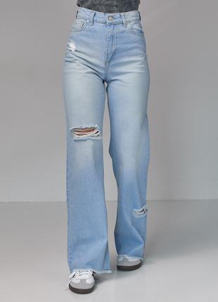 Жіночі джинси з рваними елементами - блакитний колір, 36р
