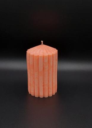 Свеча  оранжевого цвета