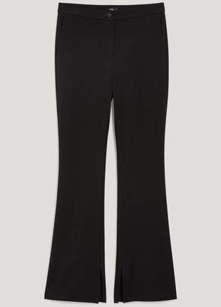 Чорні штани кльош з розрізами c&a