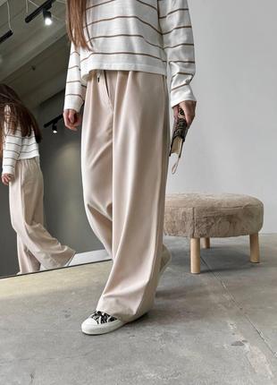 Женские брюки с декоративным шнурком цвет бежевый р.46 451526