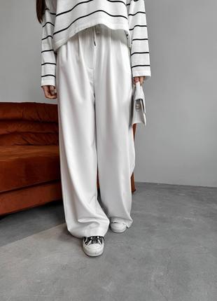 Женские брюки с декоративным шнурком цвет молочный р.44 451523
