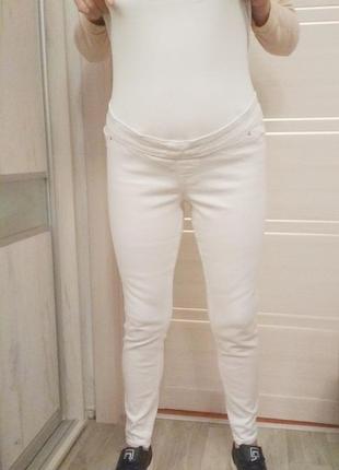 Білі джинси для вагітних.