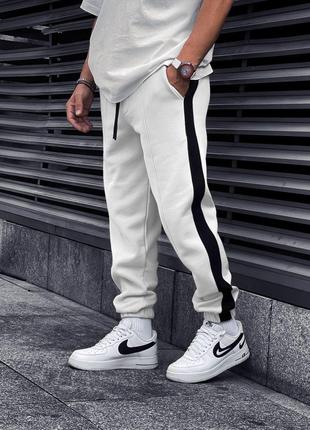 Теплі чоловічі спортивні білі штани з лампасами тринитка на флісі