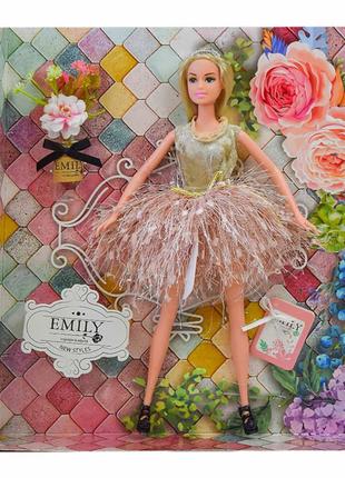 Лялька Emily Білявка в сукні з оливковим топом та пишною спідн...