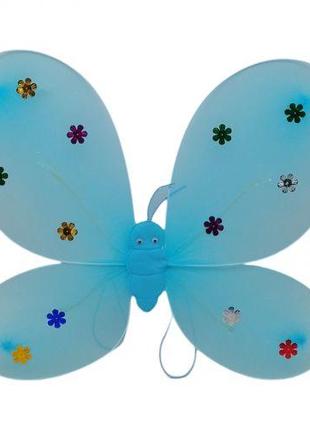 Крила метелика блакитні зі світлом