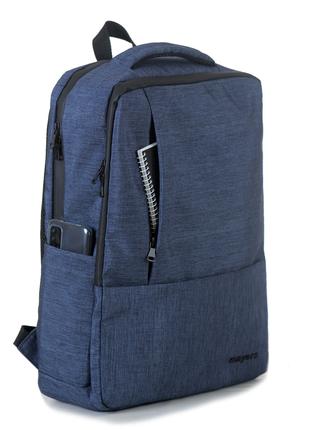 Однотонный синий вместительный рюкзак с большим количеством ка...