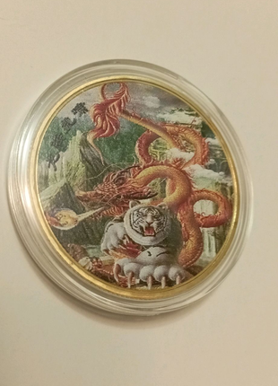 Китайська монета з тигром та драконом