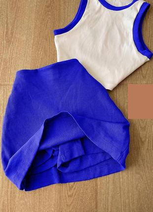 Трикотажный костюм (топ с яркой отделкой+ яркая юбка-шорты) синий