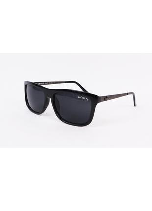 Б/У Солнцезащитные очки с металлическими дужками черные Lacoste