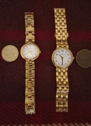 Женские наручные часы побольше и поменьше фирмы "Dugena".