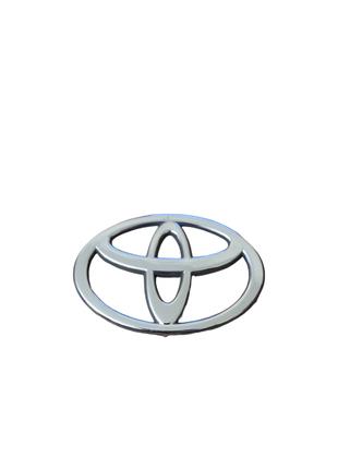 Эмблема на капот, в решетку радиатора Тойота Toyota на 2 напра...