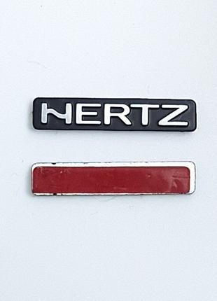 Эмблема Hertz на сетку динамика