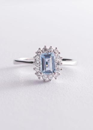 Серебряное кольцо с голубым топазом и фианитами 111461
