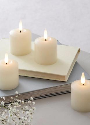 СТОК Набір із 4 світлодіодних свічок TruGlow® Votive