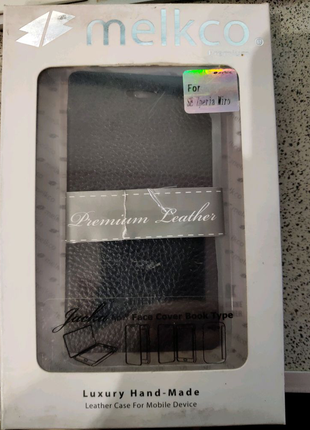 Чехол Melkco Leather Book Case  Sony Xperia Miro- ST23i-черный.