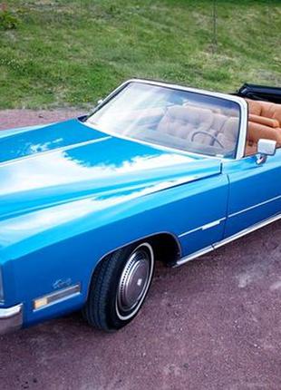 192 Ретро автомобіль Cadillac Eldorado блакитний cabrio