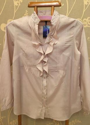 Очень красивая и стильная брендовая блузка с рюшами..вискоза/к...