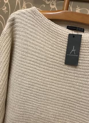 Очень красивый и стильный брендовый вязаный свитер.