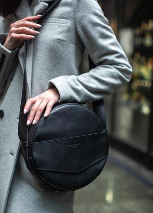 Кожаная женская круглая сумка-рюкзак maxi