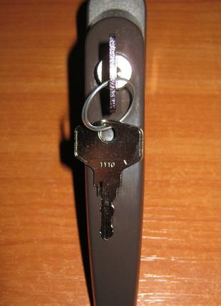 Ручка оконная с ключом антидетка Victory, коричневая (Польша).