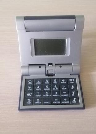 Калькулятор - часы (9 на 9 см)