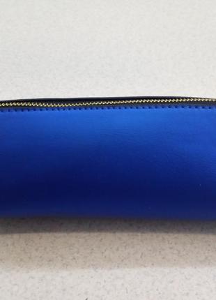 Яскраво-синя містка сумочка h&m home з лакової екошкіра.