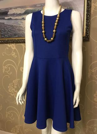 Очень красивое и стильное брендовое платье синего цвета.