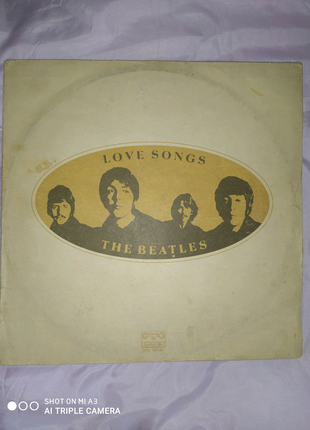 Диск с альбома Beatles