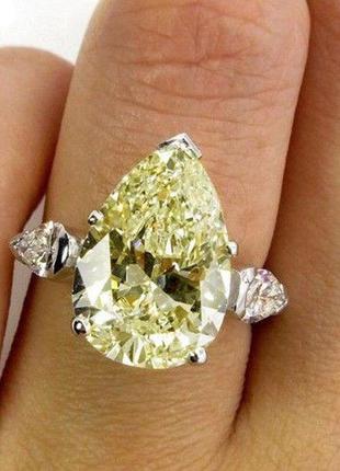 Серебряное кольцо с желтым муассанитом . размер 17.5