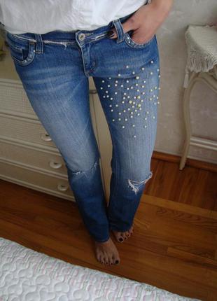 Трендовые джинсы клеш с бусинами