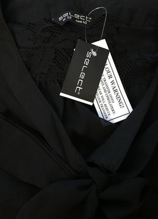 Очень красивая и стильная брендовая блузка чёрного цвета.
