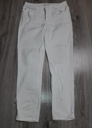 Білі рвані джинси