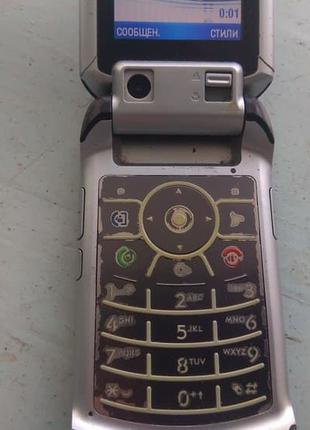 Motorola V3x + оригінальна зарядка