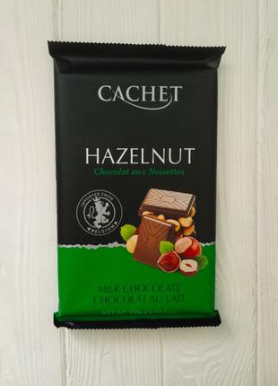 Шоколад молочный с фундуком Cachet Milk Chocolate Hazelnut 300...