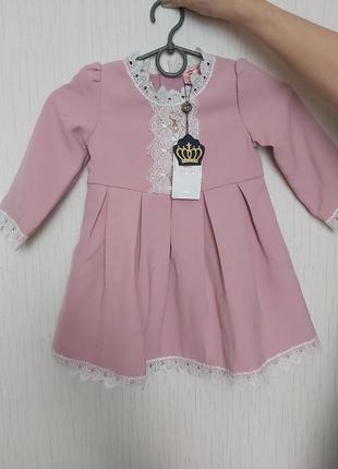 Новое детское нарядное платье в розовом цвете с кружевом на де...