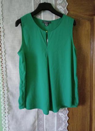 Яскраво-зелена блуза без рукавів